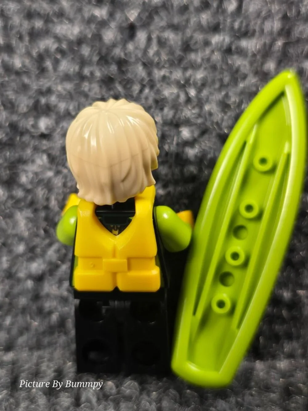 Lego minifigure is the Surfer